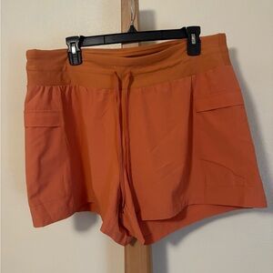 CALIA by Carrie Underwood Women's Athletic Shorts in Orange